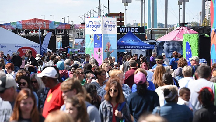 A bustling crowd enjoying an outdoor event.